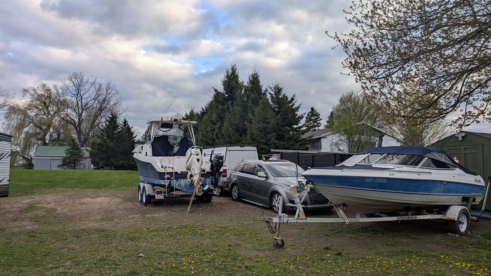Boats, RVs, SUVs and trailers parked together on the Moro Storage outdoor lot in St. Thomas, Ontario